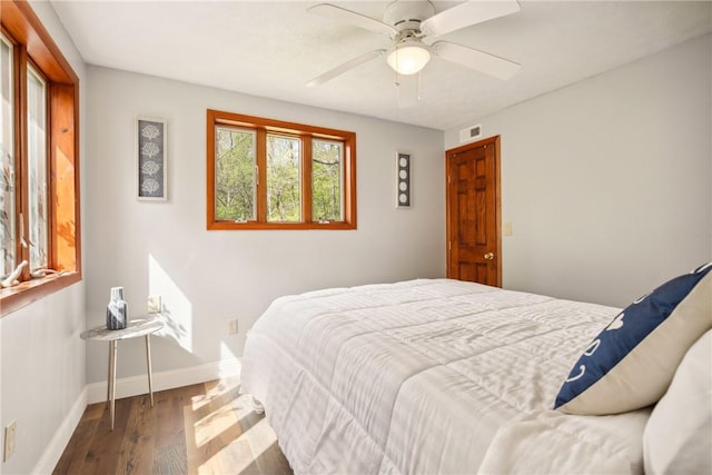 192 Wilkins Hollow Rd, Addison Twp, PA 15411 - bedroom featuring baseboards, wood finished floors, and a ceiling fan