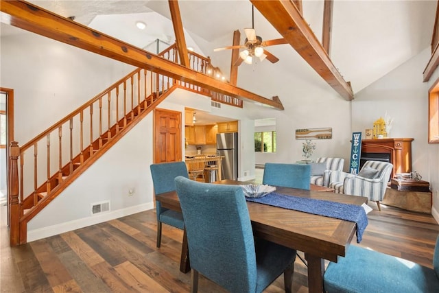 192 Wilkins Hollow Rd, Addison Twp, PA 15411 - dining room featuring stairs, high vaulted ceiling, ceiling fan, dark wood finished floors, and baseboards