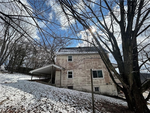 792 11th St, Pitcairn, PA 15140 - view of snowy exterior featuring fence
