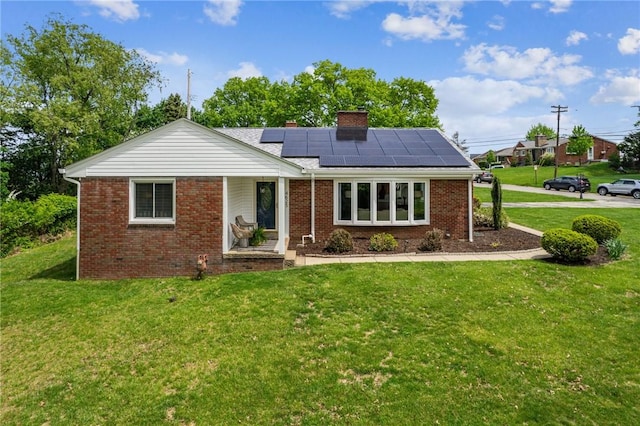 4625 Doverdell Dr, Whitehall, PA 15236 - ranch-style home featuring a front lawn, roof mounted solar panels, brick siding, and a chimney