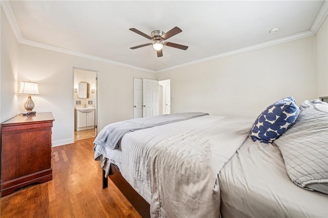 4625 Doverdell Dr, Whitehall, PA 15236 - bedroom with wood finished floors, baseboards, ornamental molding, ceiling fan, and ensuite bathroom