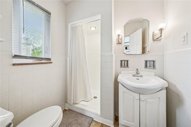 4625 Doverdell Dr, Whitehall, PA 15236 - bathroom with tile walls, toilet, a shower with shower curtain, wainscoting, and vanity