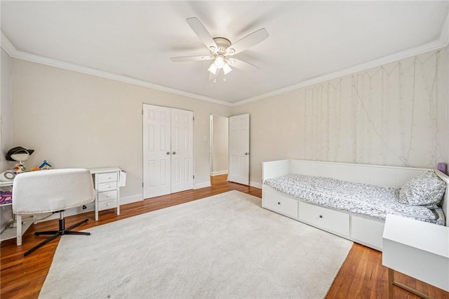 4625 Doverdell Dr, Whitehall, PA 15236 - bedroom with wood finished floors, ornamental molding, ceiling fan, and a closet