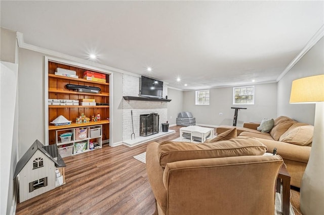 4625 Doverdell Dr, Whitehall, PA 15236 - living room featuring wood finished floors, crown molding, a fireplace, recessed lighting, and baseboards
