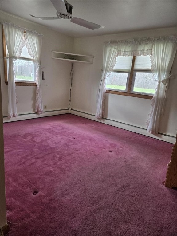 unfurnished bedroom featuring carpet floors and a ceiling fan