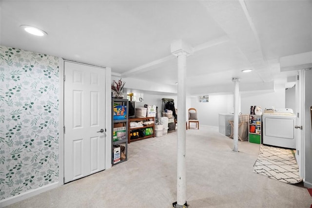 finished basement with washer / clothes dryer and carpet