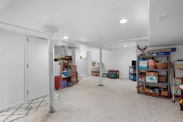finished below grade area featuring carpet flooring, recessed lighting, and baseboards