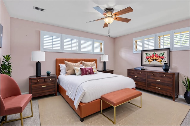 bedroom featuring baseboards and a ceiling fan