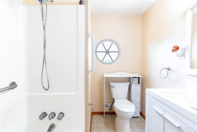 full bath featuring toilet, vanity, shower / bathtub combination, and baseboards