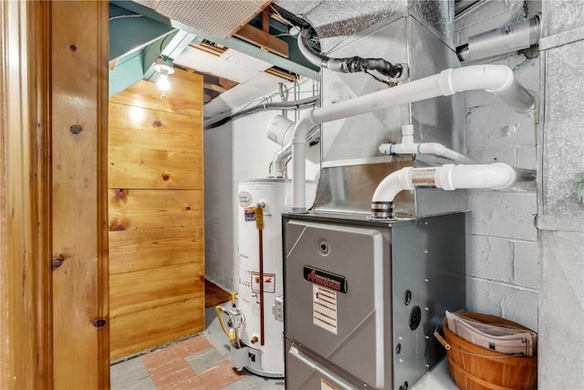 utility room with gas water heater