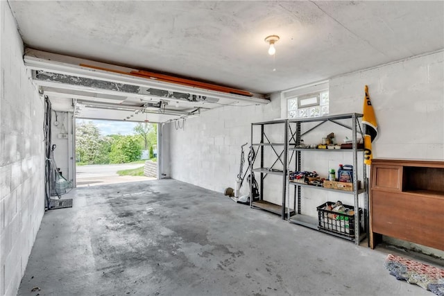 garage featuring concrete block wall