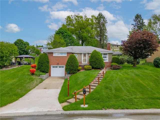 view of front facade with a gazebo, driveway, an attached garage, a front yard, and brick siding
