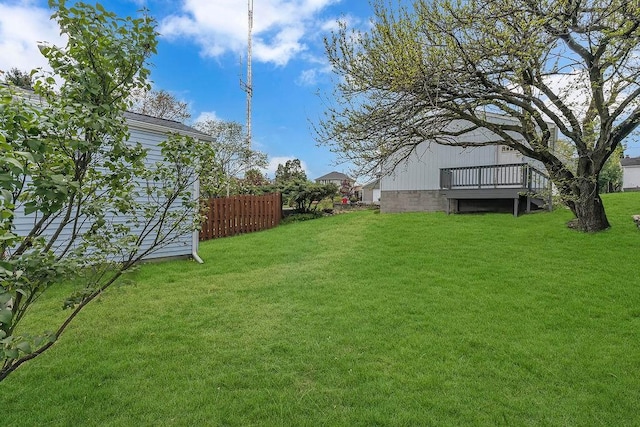 view of yard with a deck