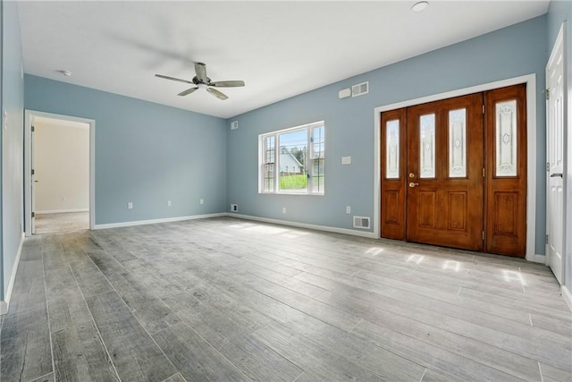 958 Cliff Mine Rd, Coraopolis, PA 15108 - entrance foyer featuring a ceiling fan, wood finished floors, and baseboards