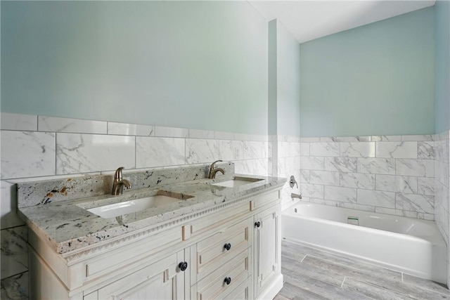 958 Cliff Mine Rd, Coraopolis, PA 15108 - full bathroom with a sink, a garden tub, wood finished floors, and tile walls