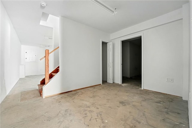 958 Cliff Mine Rd, Coraopolis, PA 15108 - empty room featuring a smoke detector, stairway, and unfinished concrete flooring
