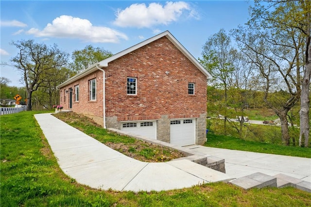 958 Cliff Mine Rd, Coraopolis, PA 15108 - view of property exterior featuring brick siding, an attached garage, and a yard