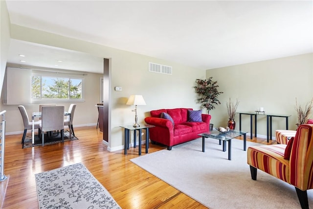 117 Teal Dr, Kennedy Twp, PA 15136 - living room featuring wood finished floors and baseboards