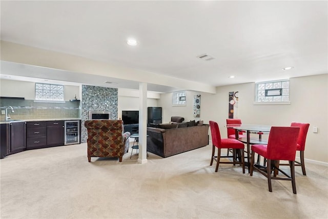 117 Teal Dr, Kennedy Twp, PA 15136 - living room with beverage cooler, light carpet, and recessed lighting