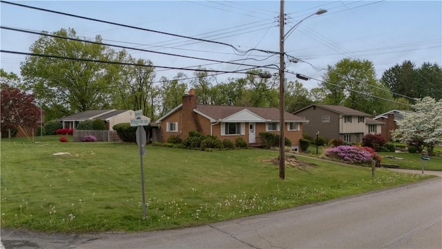 121 Pilgrim Dr, Leet Twp, PA 15143 - view of front of property featuring a chimney and a front yard