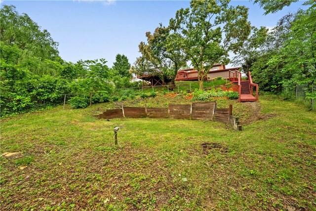 412 Palomino Dr, North Fayette, PA 15071 - view of yard featuring a deck and a forest view