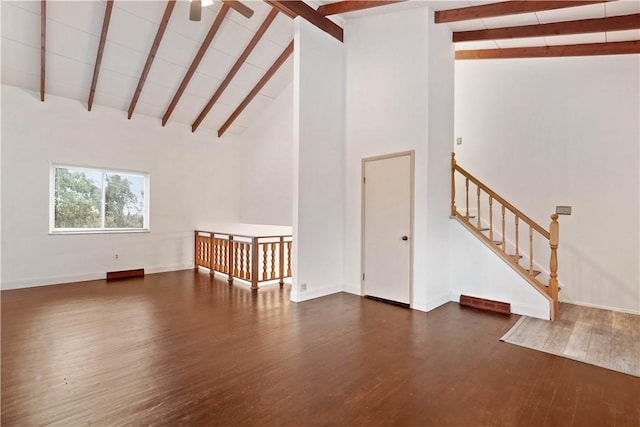 412 Palomino Dr, North Fayette, PA 15071 - unfurnished living room featuring beam ceiling, dark wood-style flooring, baseboards, ceiling fan, and high vaulted ceiling
