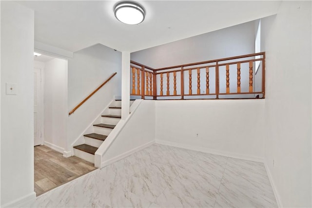 412 Palomino Dr, North Fayette, PA 15071 - stairs with baseboards and marble look tiles