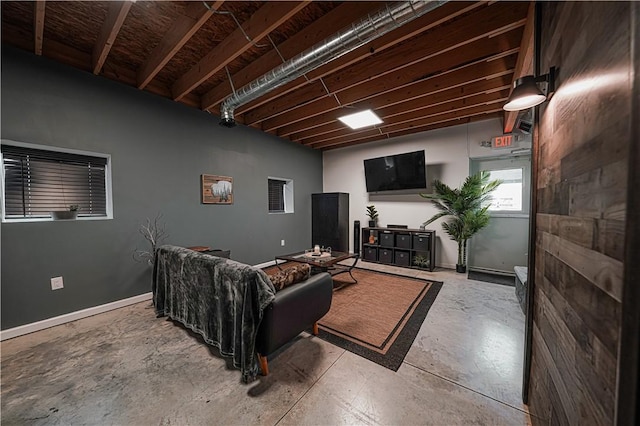 living room with concrete flooring