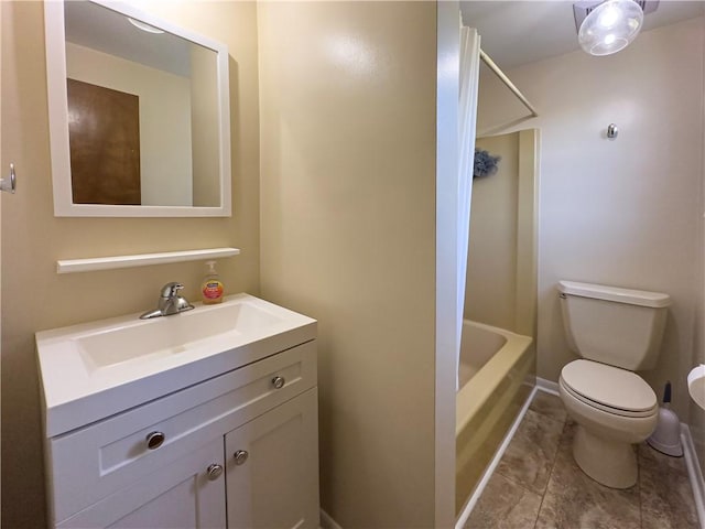 full bath featuring toilet, vanity, tile patterned floors, and shower / bath combination