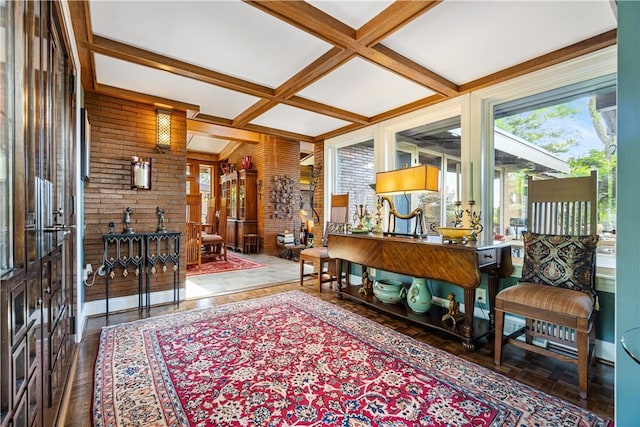 sitting room with coffered ceiling and beamed ceiling