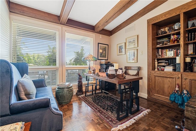 home office featuring beamed ceiling