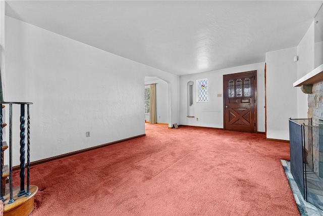 2405 Whited St, Brookline, PA 15226 - unfurnished living room with carpet, arched walkways, and baseboards