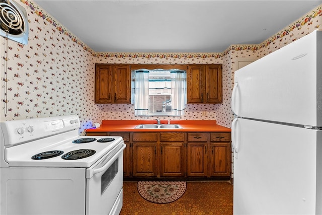 2405 Whited St, Brookline, PA 15226 - kitchen featuring white appliances, wallpapered walls, a sink, brown cabinetry, and dark flooring