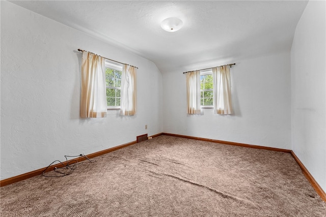 2405 Whited St, Brookline, PA 15226 - carpeted spare room with baseboards, lofted ceiling, and a textured wall
