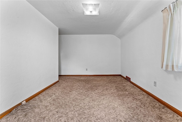 2405 Whited St, Brookline, PA 15226 - bonus room featuring lofted ceiling, carpet flooring, baseboards, and a textured ceiling