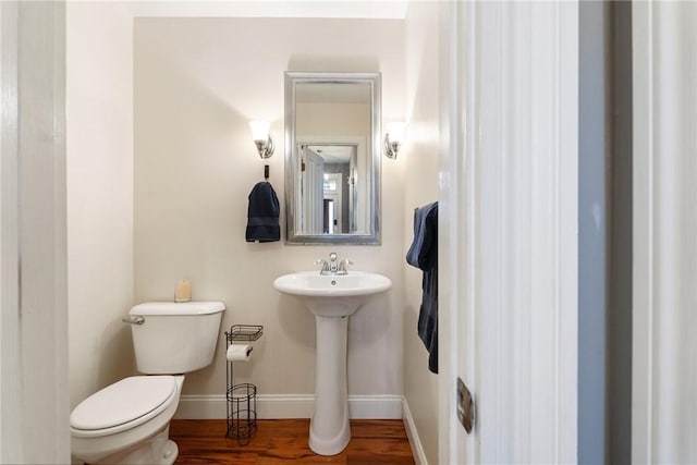 526 Armandale St, Central North Side, PA 15212 - bathroom featuring wood finished floors, baseboards, and toilet