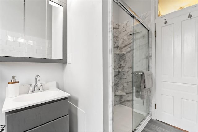 526 Armandale St, Central North Side, PA 15212 - full bath with a marble finish shower, vanity, and wood finished floors