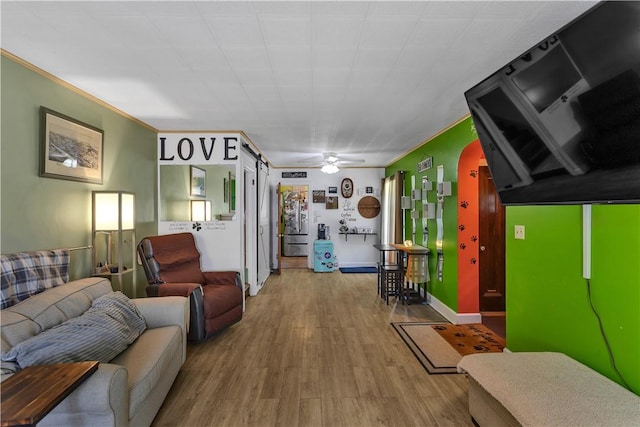 830 Wayne Ave, Ellwood City Law, PA 16117 - living room with wood finished floors, a ceiling fan, and baseboards