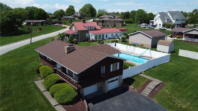 aerial perspective of suburban area with a pool area