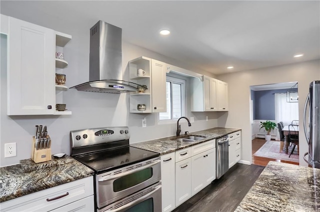 kitchen featuring extractor fan, appliances with stainless steel finishes, open shelves, a sink, and recessed lighting