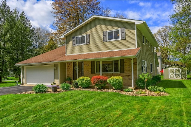 traditional home with a garage, driveway, a storage shed, a front lawn, and brick siding