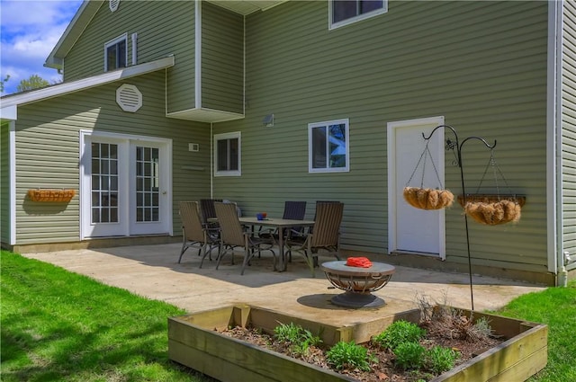 back of house with a patio