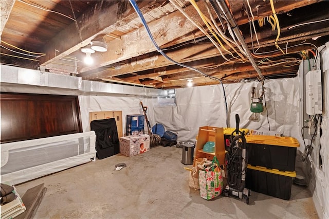 unfinished below grade area featuring gas meter