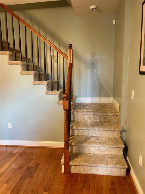 615 Tripoli St, East Allegheny, PA 15212 - stairs featuring hardwood / wood-style floors and baseboards