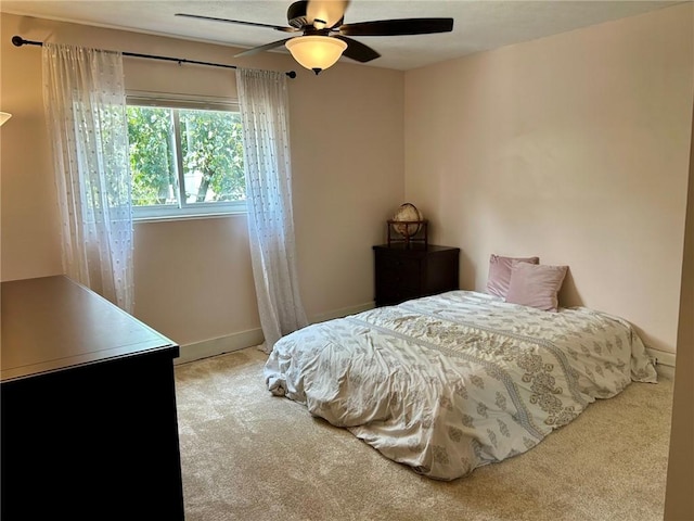 615 Tripoli St, East Allegheny, PA 15212 - carpeted bedroom with baseboards and a ceiling fan