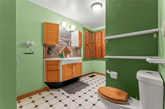 128 Evergreen Dr, Peters Twp, PA 15317 - bathroom with tile patterned floors, toilet, baseboards, and vanity