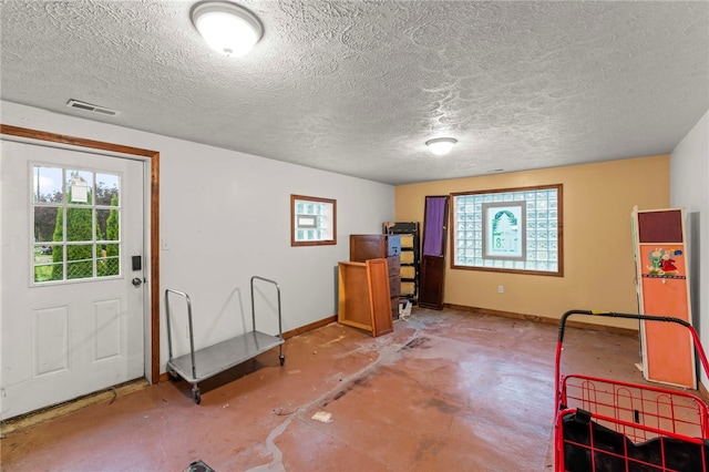 128 Evergreen Dr, Peters Twp, PA 15317 - interior space featuring baseboards and a textured ceiling