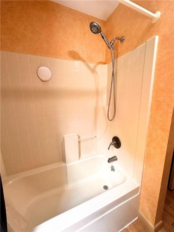 bathroom featuring bathing tub / shower combination