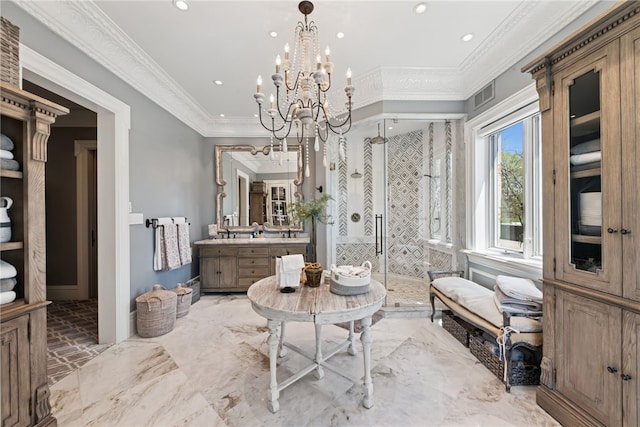 bathroom featuring a shower stall, crown molding, a chandelier, recessed lighting, and vanity