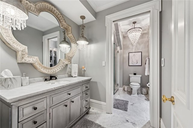 bathroom with a chandelier, marble look tiles, ornamental molding, a shower stall, and vanity